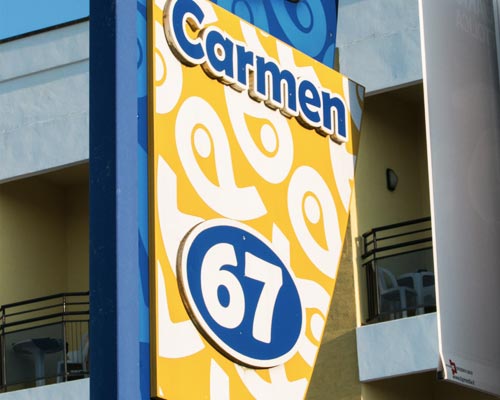 Carmen 67 beach sign