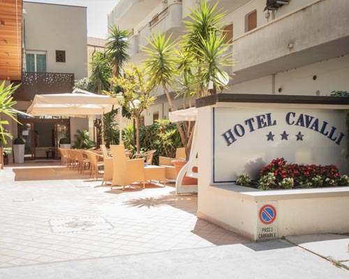 The sign and the entrance to the hotel